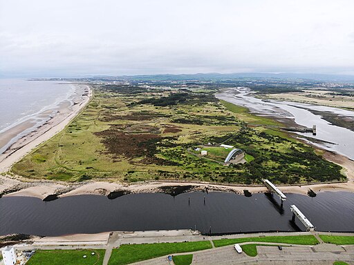 Oblong shaped peninsula surrounded by beaches, sea and rivers
